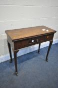 A GEORGE III MAHOGANY TEA TABLE, the fold over top and gate leg, single frieze drawer, on
