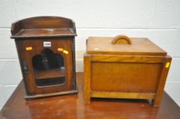 AN EARLY 20TH CENTURY OAK SMOKERS CABINET, with a fitted interior, and one key, width 29cm x depth