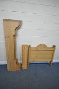 A PINE SINGLE BED STEAD, with side rails and slats (condition - one end distressed)