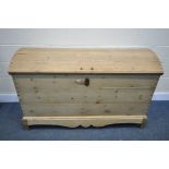 A 19TH CENTURY AND LATER PINE DOMED TOP TRUNK, tapered form, with iron handles, enclosing an