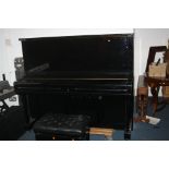 A YAMAHA U3 UPRIGHT PIANO in gloss black, Serial No H2177425, Condition very good apart from a scuff