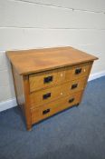 A COTSWOLD SCHOOL STYLE SOLID OAK CHEST OF TWO SHORT OVER TWO LONG DRAWERS, with circular wrought