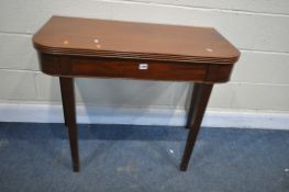 A GEORGIAN MAHOGANY TEA TABLE, with a fold over top, reeded edge, square tapered legs, open 91cm