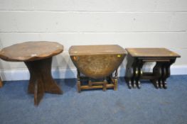 A RUSTIC CIRCULAR OCCASIONAL TABLE, a small oak drop leaf occasional table, and a nest of three