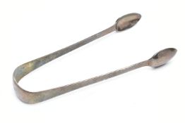 A PAIR OF GEORGE IV SILVER SUGAR TONGS OF PLAIN FORM, engraved initial 'H' to the bow, maker Clement