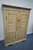 A 19TH CENTURY AND LATER PINE PANTRY/LARDER CUPBOARD, with a loose cornice, the two fielded panel