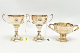 THREE 20TH CENTURY SILVER TWIN HANDLED TROPHY CUPS, comprising two with enamelled crests, one