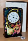 A MOORCROFT POTTERY 'QUEENS CHOICE' PATTERN MANTEL CLOCK, designed by Emma Bossons, with impressed