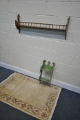 A MAHOGANY SPINDLE WALL SHELF, a painted wall shelf, and a G H Frith floral rug, 152cm x 91cm (3)
