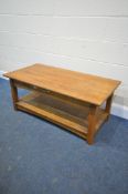 A GOLDEN OAK COFFEE TABLE, with a single drawer to each side, with undershelf, length 117cm x