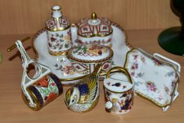 A GROUP OF ROYAL CROWN DERBY, comprising a miniature garden roller, height 9.5cm, and watering