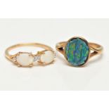 TWO OPAL RINGS, the first designed with two claw set, oval cut opal cabochons, interspaced with