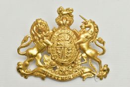 A VICTORIAN EMBOSSED GILT METAL ROYAL COAT OF ARMS BADGE, with motto Dieu Et Mon Droit, height 10.