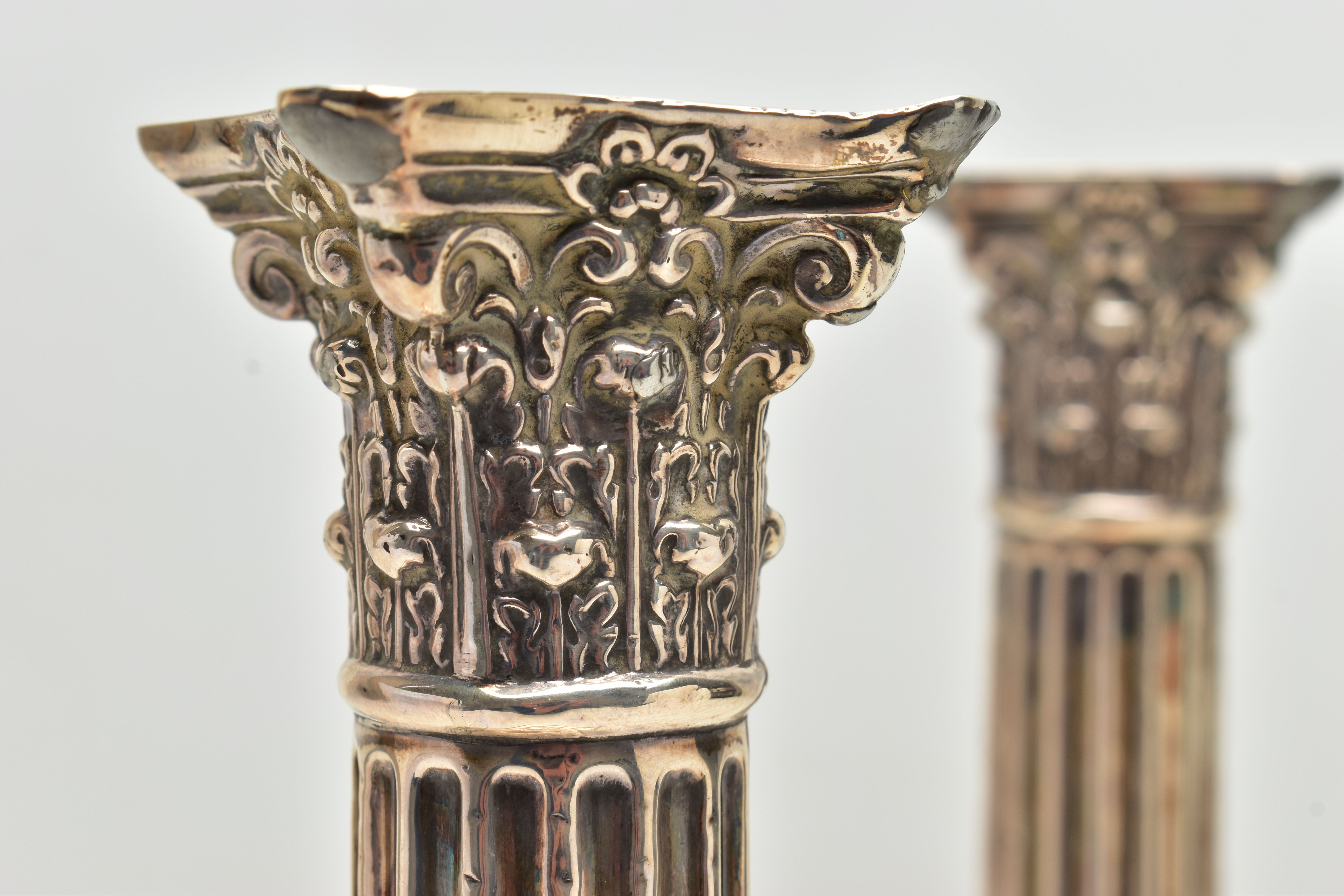 A PAIR OF GEORGE V SILVER CORINTHIAN COLUMN CANDLESTICKS, fluted and stop reeded columns on - Image 2 of 7