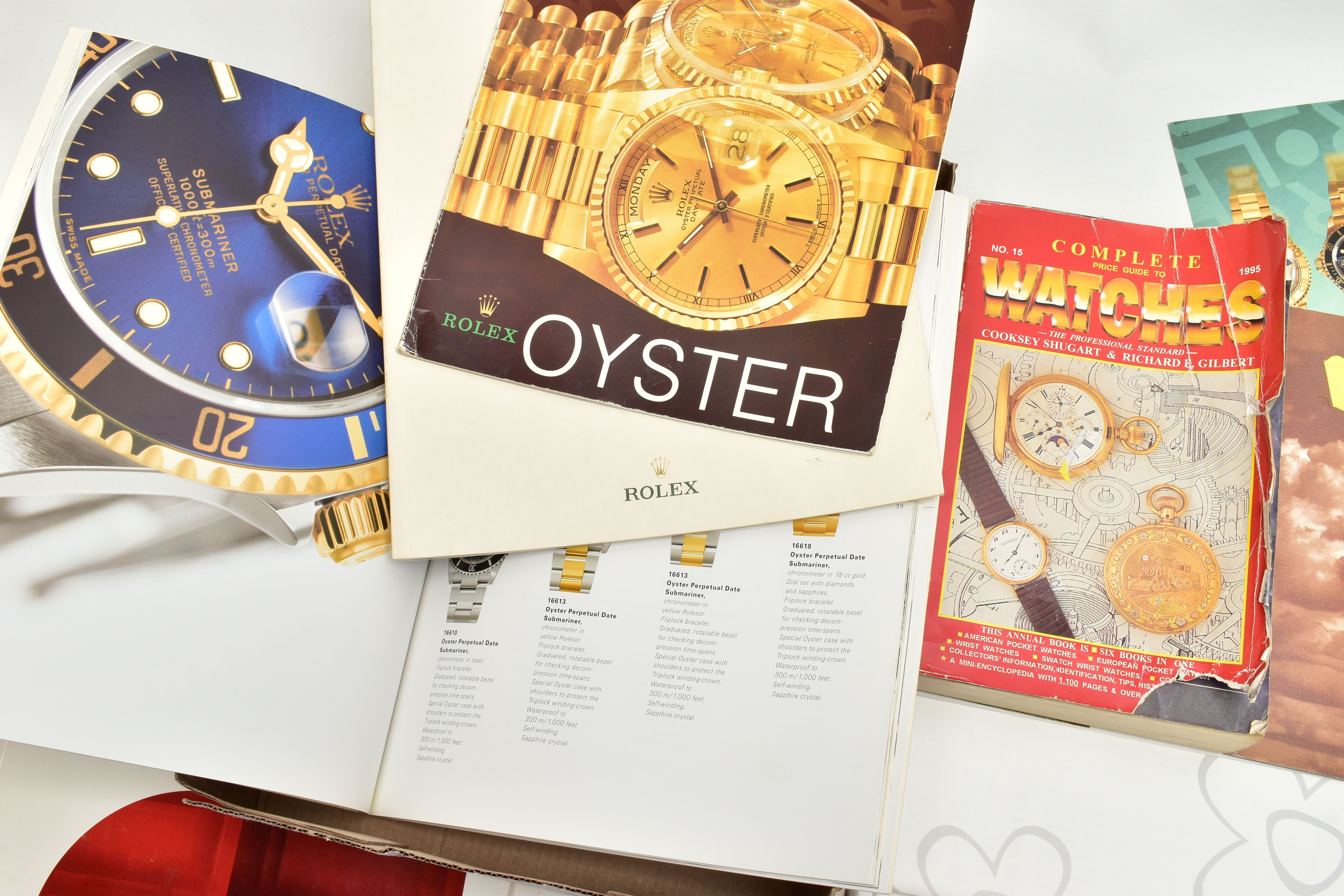 A SELECTION OF WATCH CATALOGUES AND BOOKLETS, to include an 'Omega collection' booklet, an ' - Image 3 of 3