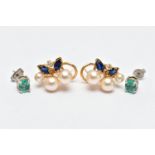 TWO PAIRS OF EARRINGS, the first a pair of oval cut emerald stud earrings, each in a four claw white