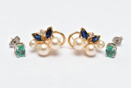 TWO PAIRS OF EARRINGS, the first a pair of oval cut emerald stud earrings, each in a four claw white