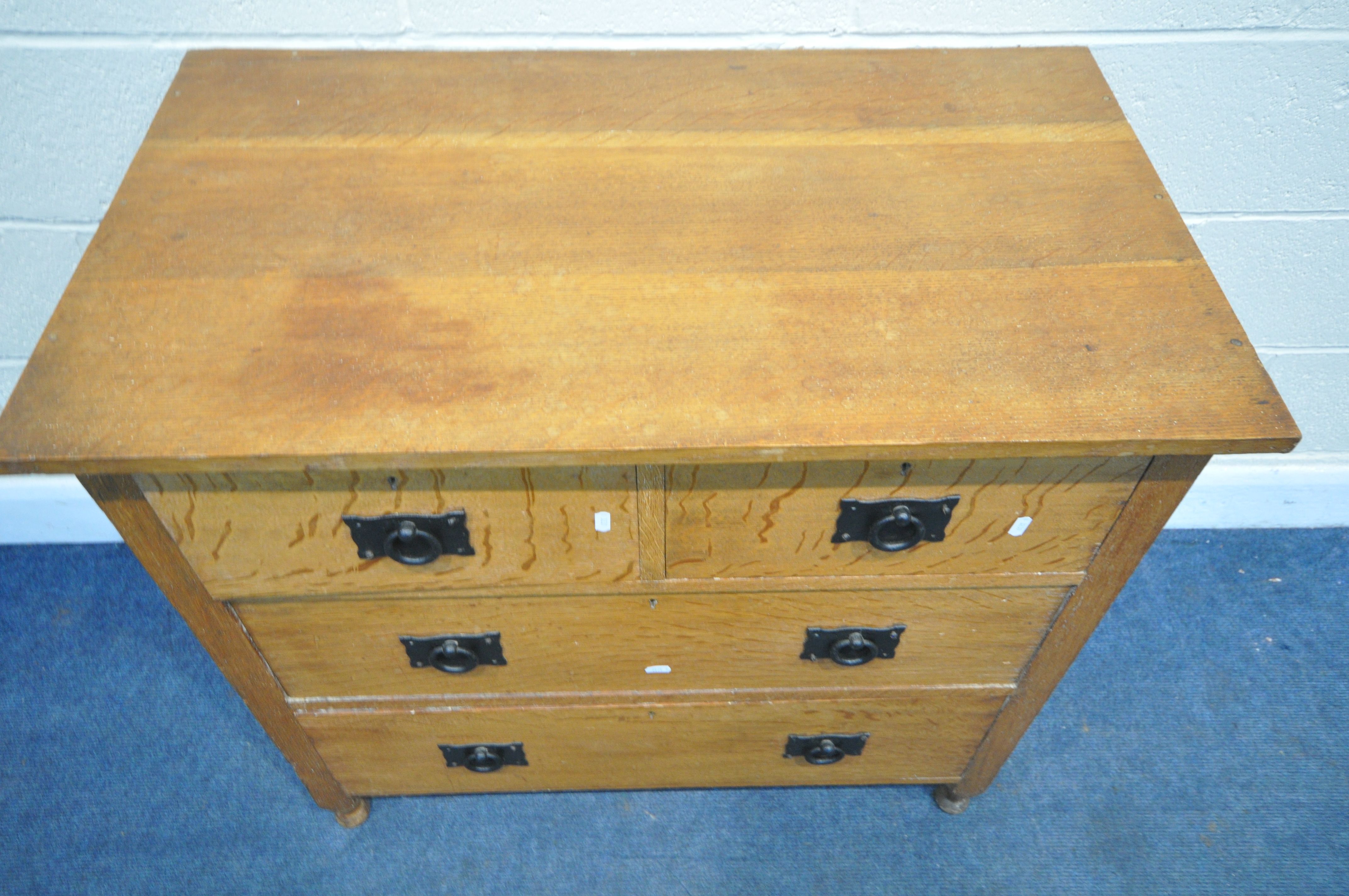 A COTSWOLD SCHOOL STYLE SOLID OAK CHEST OF TWO SHORT OVER TWO LONG DRAWERS, with circular wrought - Image 3 of 4