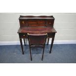 A 20TH CENTURY MAHOGANY CAPTAINS DESK, the raised back with two doors, flanking two banks of three