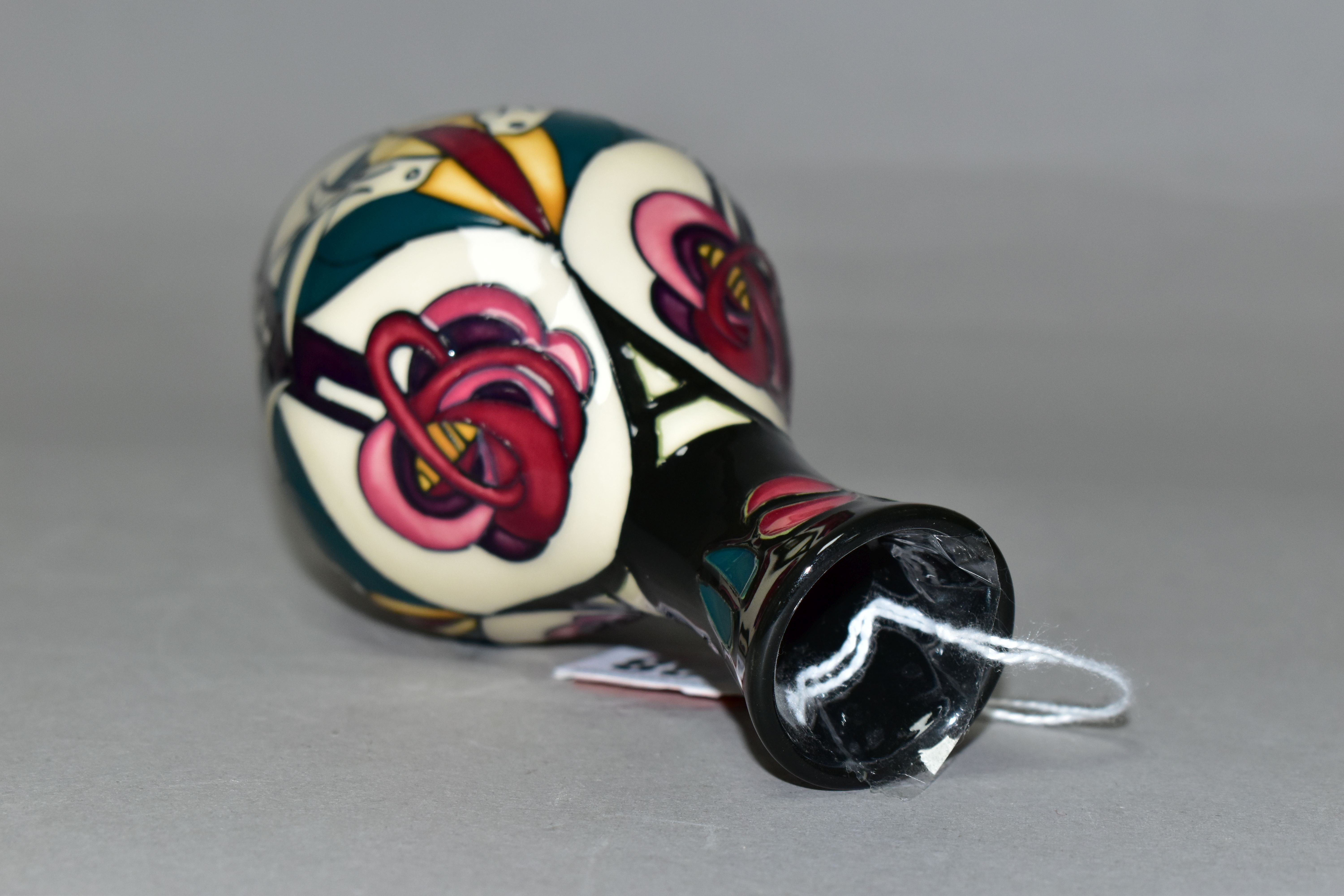 A MOORCROFT POTTERY 'MELODY' PATTERN, bud vase with original box, designed by Sian Leaper, decorated - Image 4 of 5