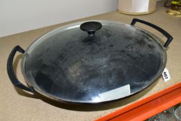 A LE CREUSET CAST IRON WOK, with clear glass lid, impressed 36 on the base (1) (Condition Report: