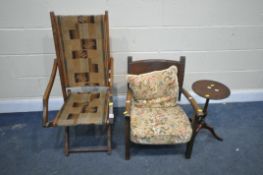 AN EARLY 20TH CENTURY FOLDING ARMCHAIR, with a fabric seat, a beech armchair, with a leatherette