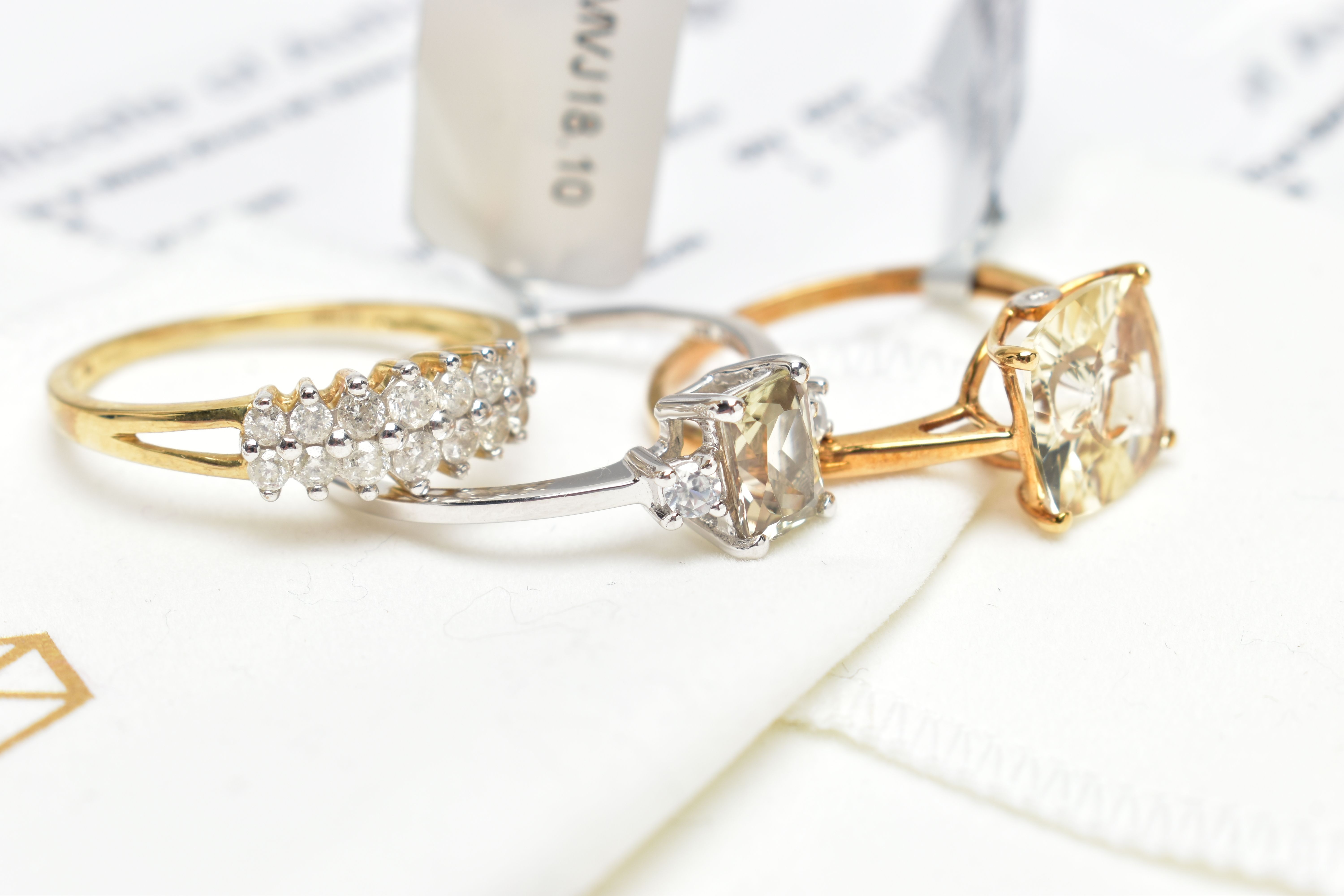 THREE GEM SET RINGS, to include a yellow metal diamond ring, set with two rows of brilliant cut - Image 3 of 5