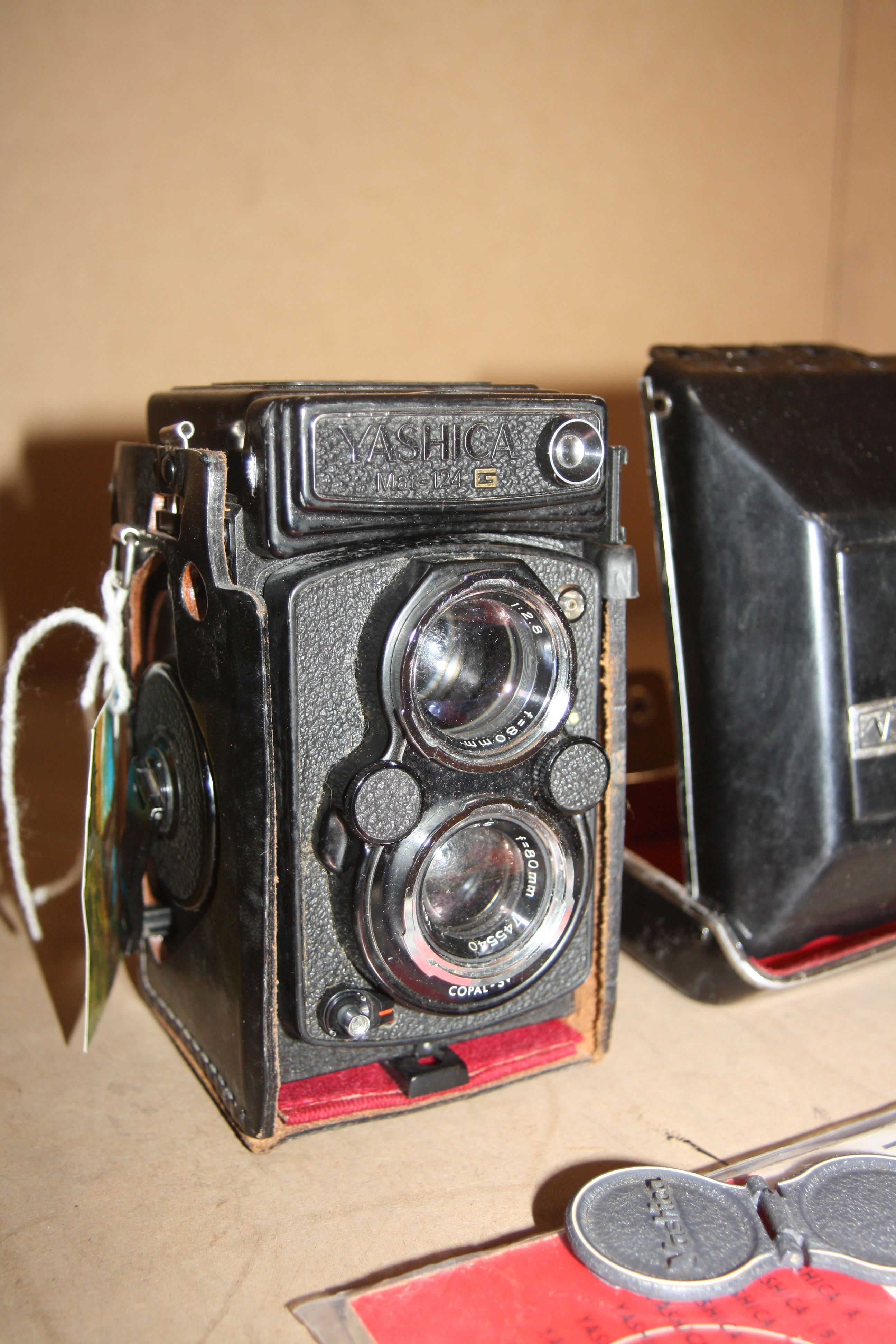 A YASHICA MAT 124G TLR CAMERA with 80mm f 2.8 and f3.5 lenses and leather case along with Yahica - Image 2 of 5