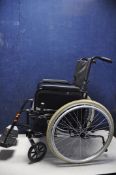 A DASH LITE WHEELCHAIR self-propelled wheelchair with footrests
