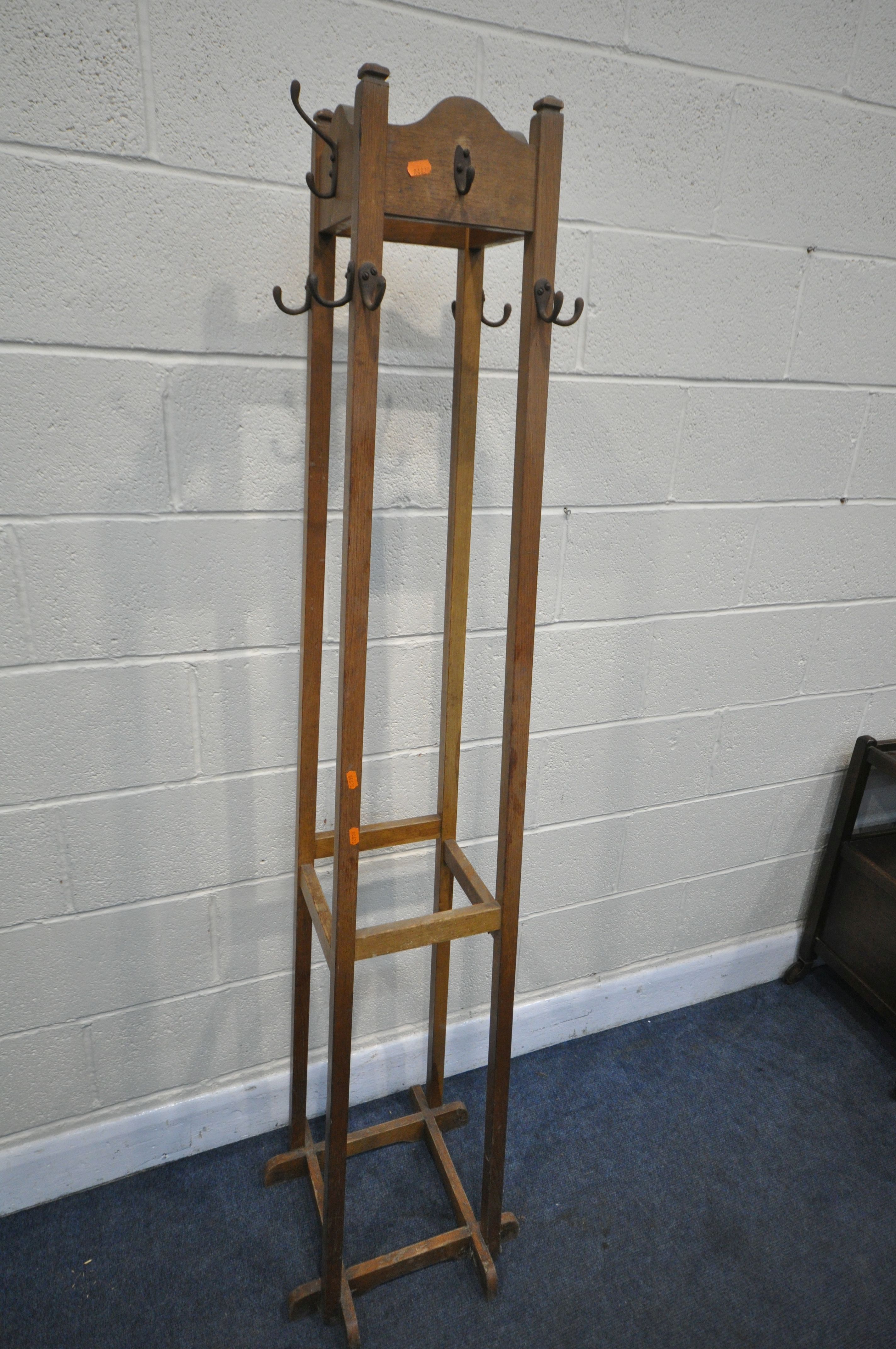 AN EARLY 20TH CENTURY OAK SQUARE TAPERED COAT/HAT STAND, height 180cm