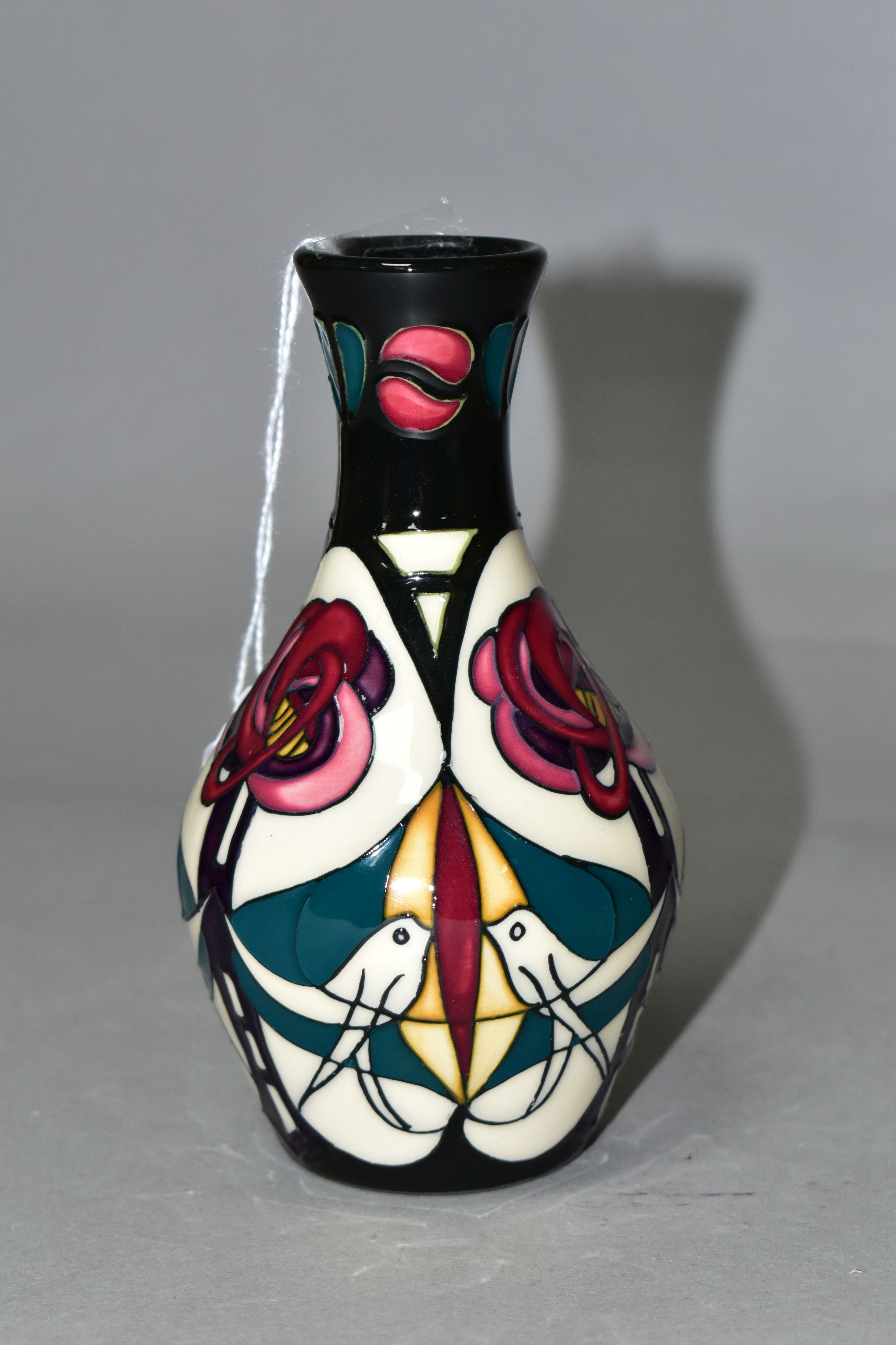 A MOORCROFT POTTERY 'MELODY' PATTERN, bud vase with original box, designed by Sian Leaper, decorated - Image 2 of 5