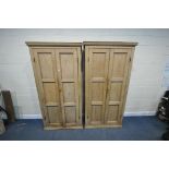 A PAIR OF 19TH CENTURY AND LATER PINE PANELLED SCHOOL CUPBOARDS, each having double doors that's