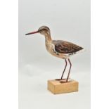 A MODERN PAINTED WOODEN MODEL OF A REDSHANK TYPE WADING BIRD WITH WIRE LEGS, mounted on a