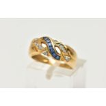 A YELLOW METAL SAPPHIRE AND DIAMOND RING, designed with a row of square cut blue sapphires,