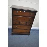 A STAG MINSTREL CHEST OF SEVEN DRAWERS, width 82cm x depth 47cm x height 104cm (condition - drop