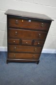 A STAG MINSTREL CHEST OF SEVEN DRAWERS, width 82cm x depth 47cm x height 104cm (condition - drop
