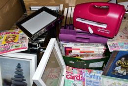 THREE BOXES OF CRAFTING ITEMS AND PICTURE FRAMES, to include a boxed Spellbinders Grand Calibur