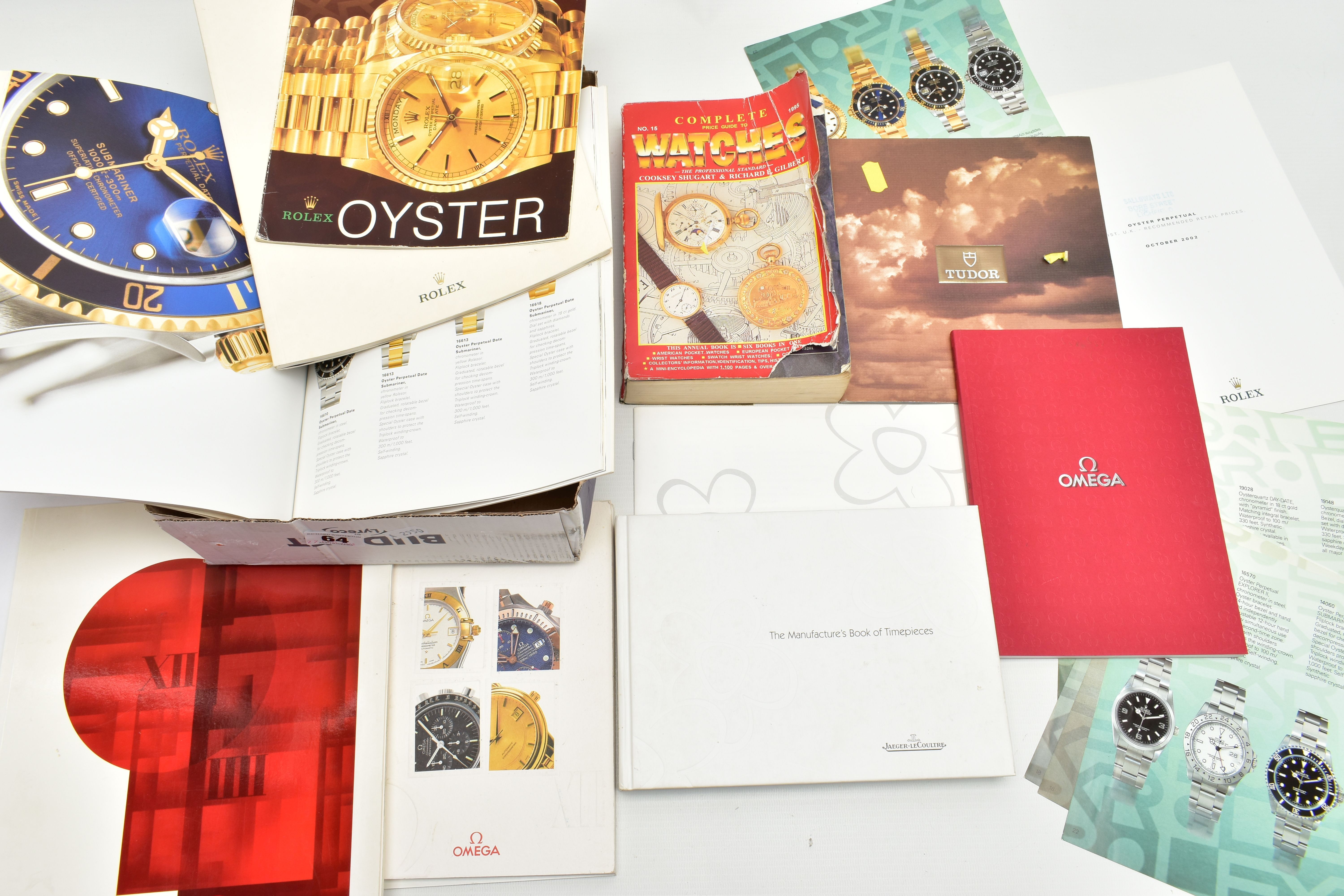 A SELECTION OF WATCH CATALOGUES AND BOOKLETS, to include an 'Omega collection' booklet, an '