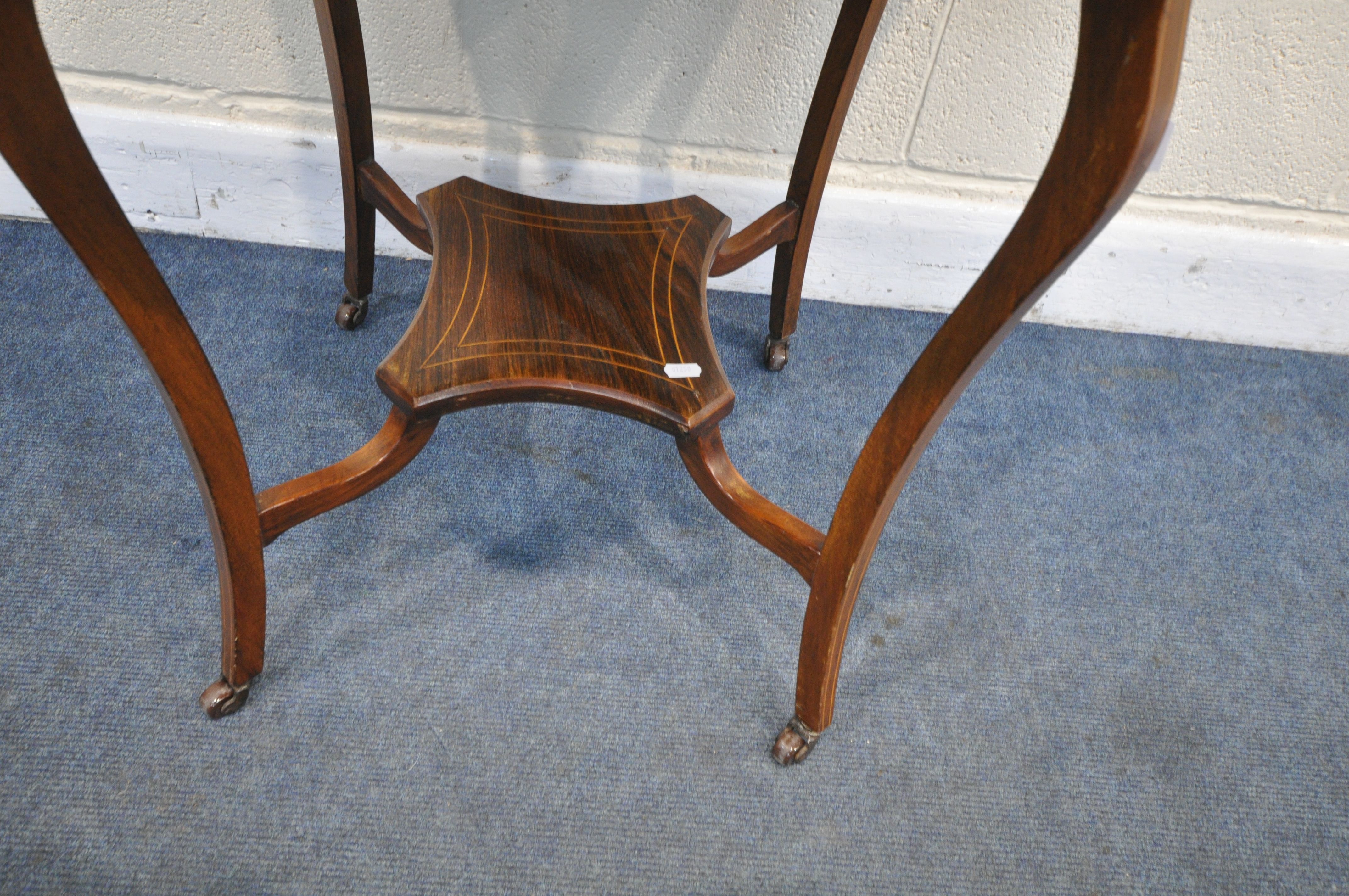 AN EDWARDIAN ROSEWOOD OCTAGONAL CENTRE TABLE, with a wavy edge top, shaped legs and stretchers, - Image 4 of 4