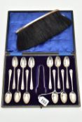 A CASED SET OF TWELVE GEORGE V SILVER TEASPOONS AND MATCHING SUGAR TONGS, foliate design to the