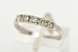A FIVE STONE DIAMOND RING, five round brilliant cut diamonds prong set in a white metal band,