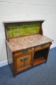 AN ARTS AND CRAFTS MAHOGANY WASHSTAND, with a green tiled mirror back, marble top, on a base with