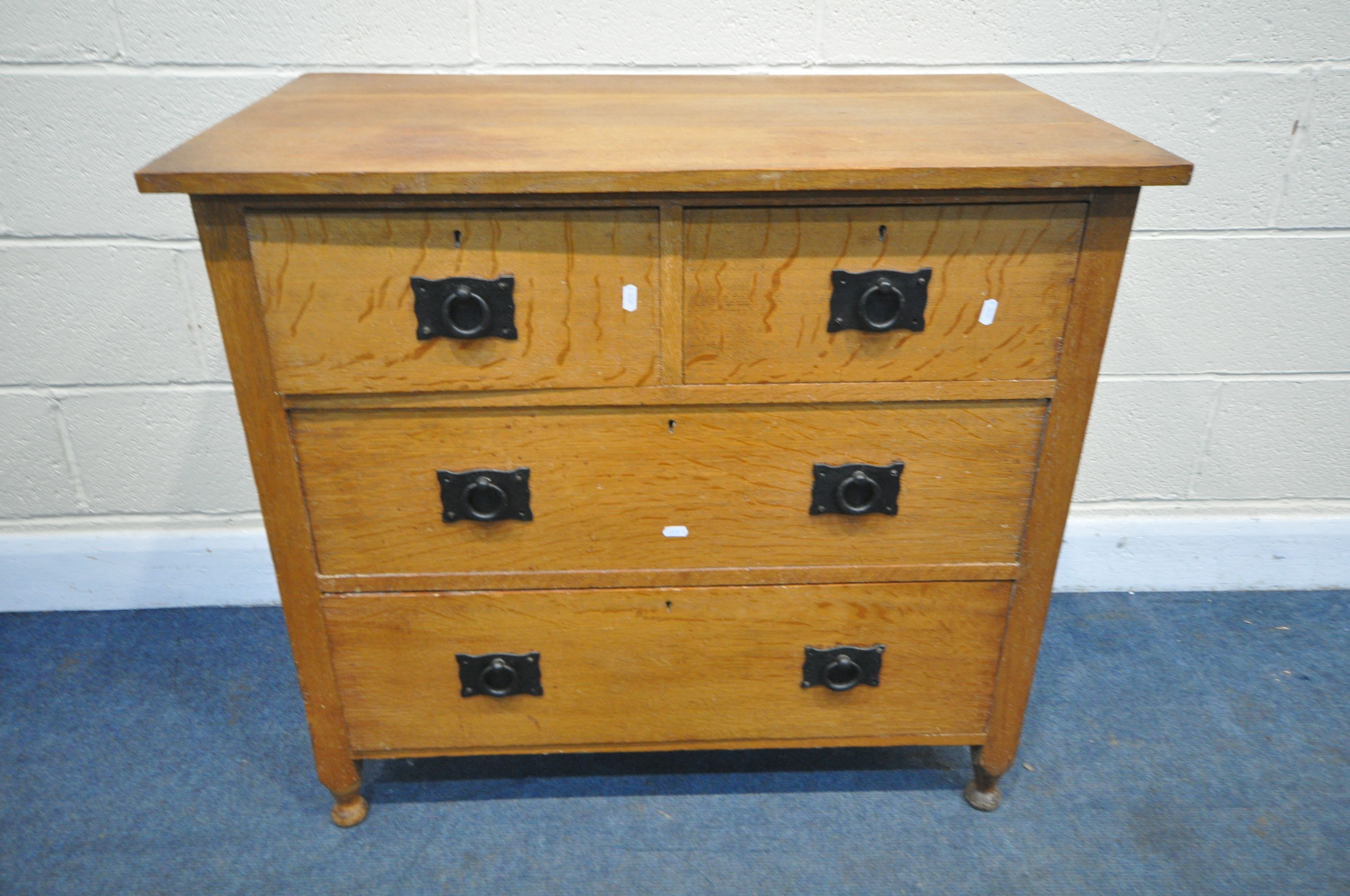 A COTSWOLD SCHOOL STYLE SOLID OAK CHEST OF TWO SHORT OVER TWO LONG DRAWERS, with circular wrought - Image 2 of 4