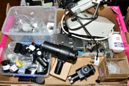 A BOX OF ASSORTED MICROSCOPE PARTS, to include oculars, an illuminator, two 35mm camera adaptors,