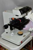 A LEITZ DIALUX 20 EB LABORATORY AND RESEARCH BINCOCULAR MICROSCOPE, with cable power supply and
