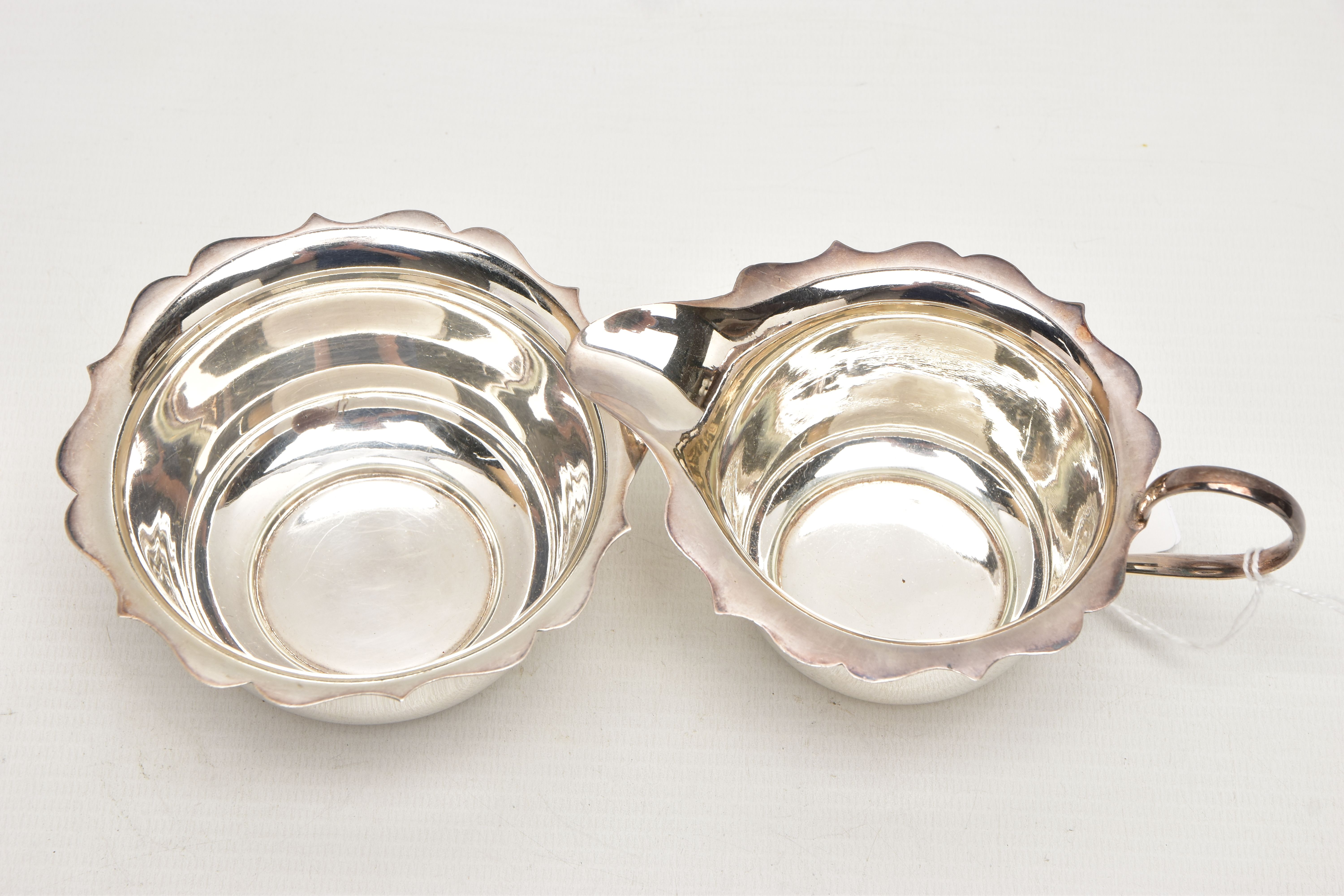 A GEORGE VI SILVER CREAM JUG AND SUGAR BOWL WITH WAVY RIMS, maker Arnold E Williams, Birmingham - Image 2 of 4