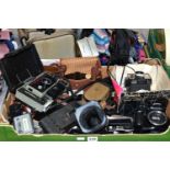 TWO TRAYS CONTAINING CAMERAS AND PHOTOGRAPHIC EQUIPMENT, including a Canon EOS 1100D Digital SLR,