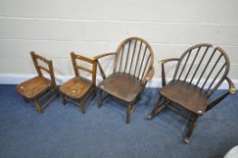A PAIR OF DARK ERCOL 290 ROCKING ARMCHAIRS, and a pair of child's elm seated chairs (condition - one
