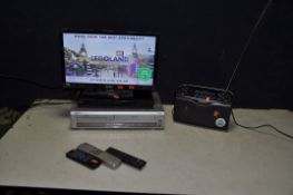 AN ALBA 19in TV with remote, a Tesco DVD player with remote, a Philips DVD/Video combi with