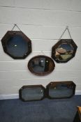FIVE VARIOUS WALL MIRRORS, comprising four sized oak octagonal wall mirrors, largest 80cm x 52cm,